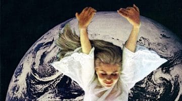 Woman floating over the earth.