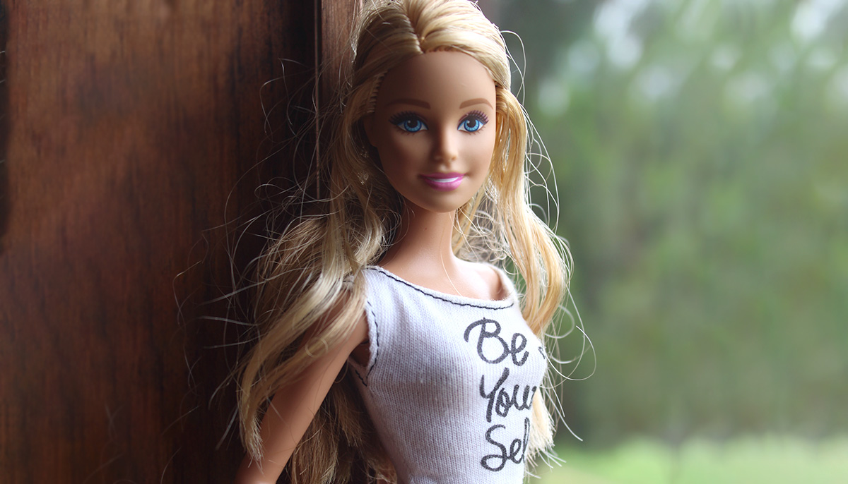 Barbie wears a shirt that says "be yourself"
