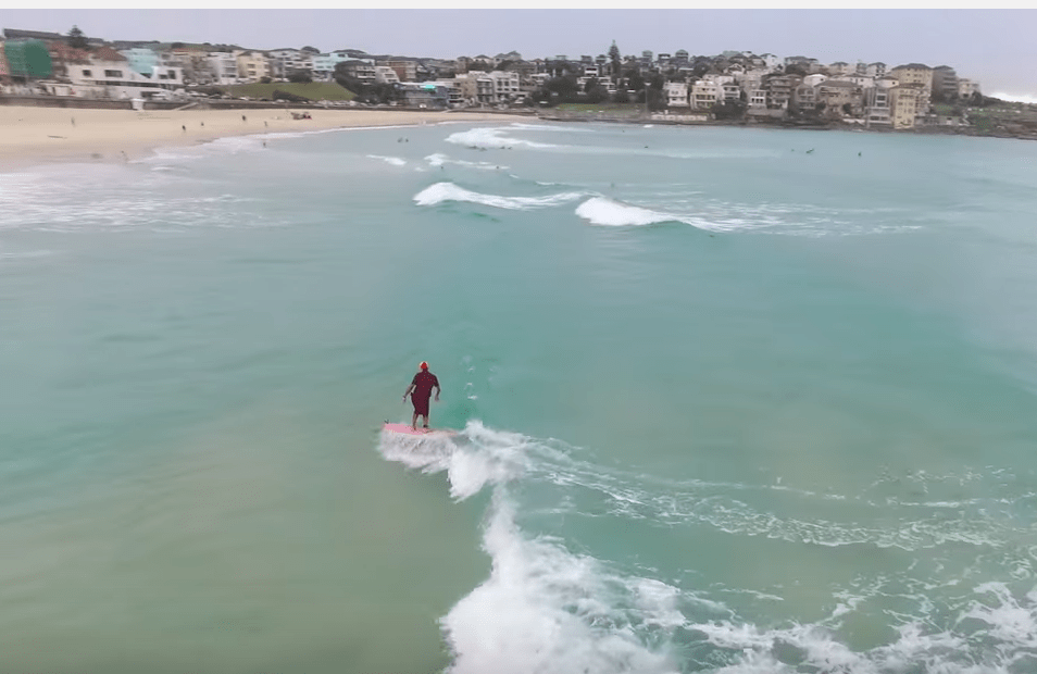 Gyuto monk surfing in Bondi Beach, Australia