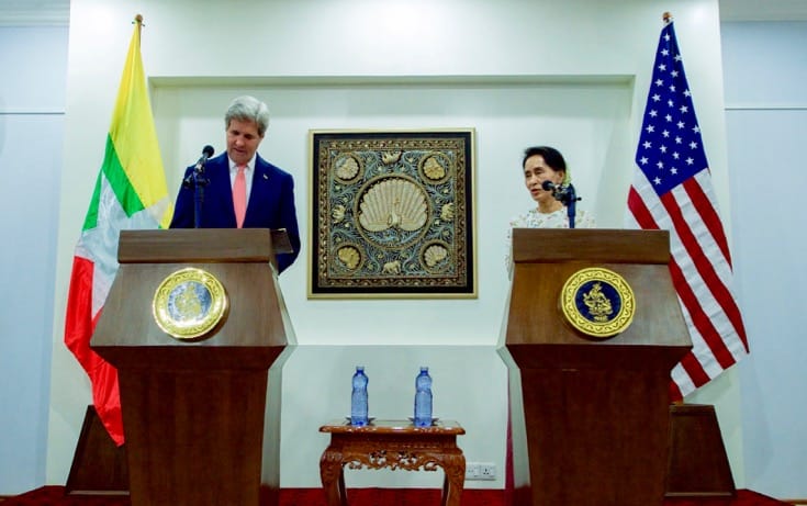 Aung San Suu Kyi and John Kerry address reporters.