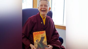 Pema Chodron holding "Harry Potter".