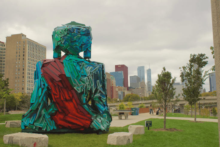 Tashi Norbu's "urban Buddha" sculpture, formally named "Be the flower, not the bee" looks over Chicago's Grant Park. Photo courtesy of the artist.
