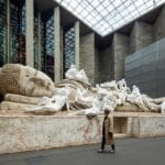 National Gallery of Australia unveils giant sculpture of sleeping Buddha covered in of Western figures