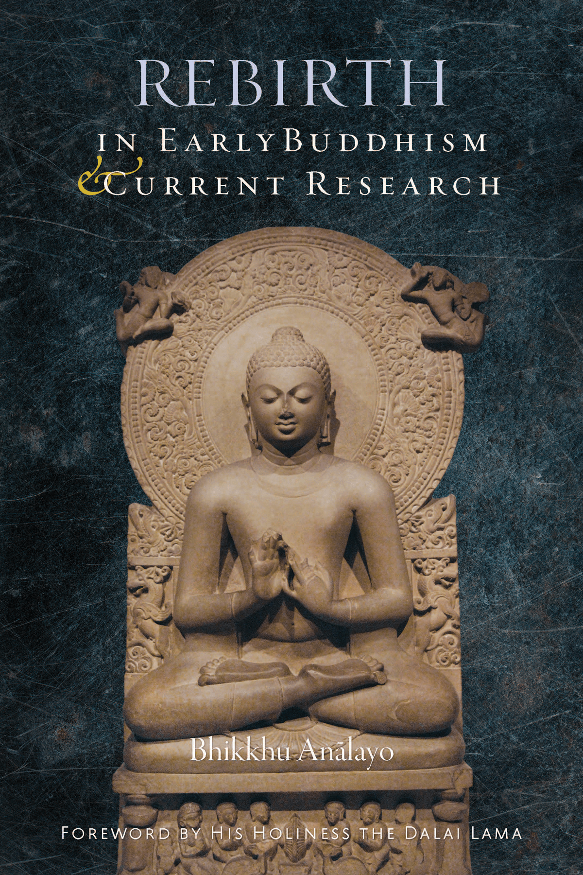 Book cover for "Rebirth in early buddhism and current research." It shows a statue praying against a blue wall.
