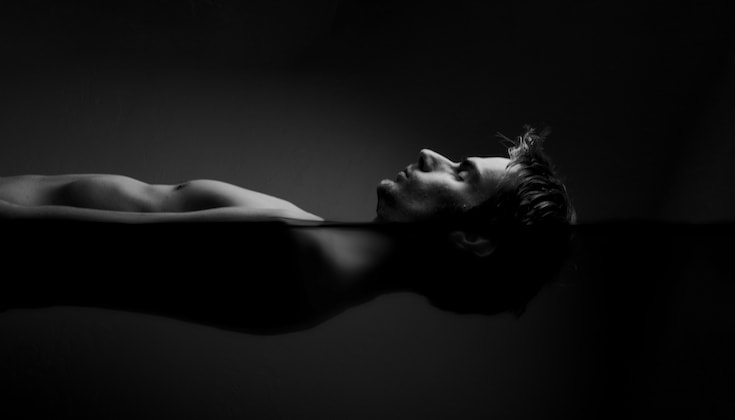 Man in flotation tank.