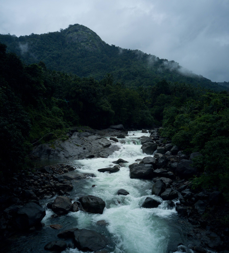 A photo of water going down a stream.