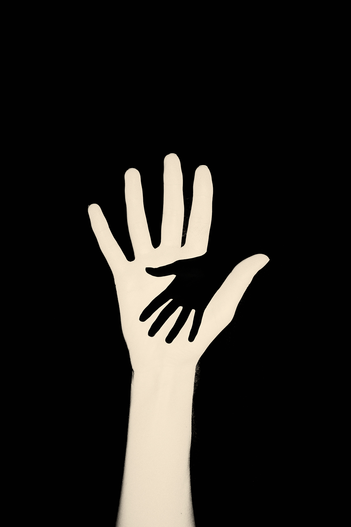 Two hands intertwined.